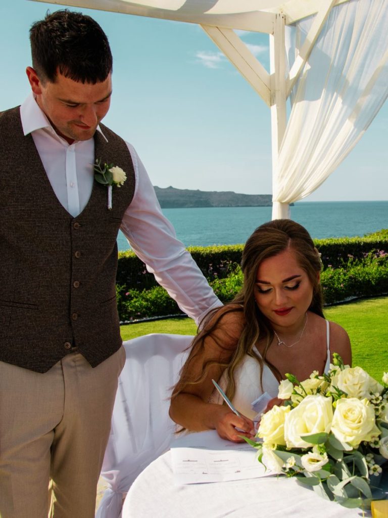 Signing wedding papers after wedding ceremony in Chania Crete